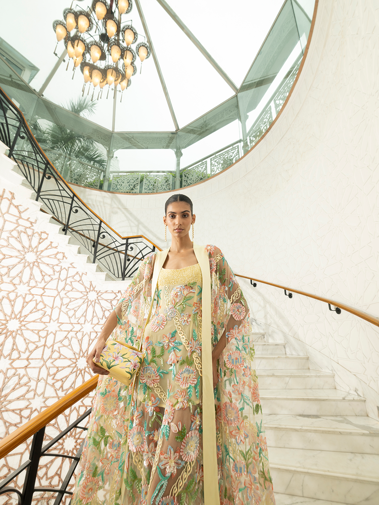 Couture handwork cape with floral embroidery, perfect for destination party outfits and luxury evenings