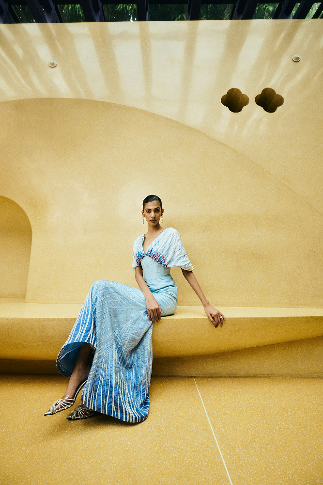 Floor length couture dress styled as an elegant reception wear dress