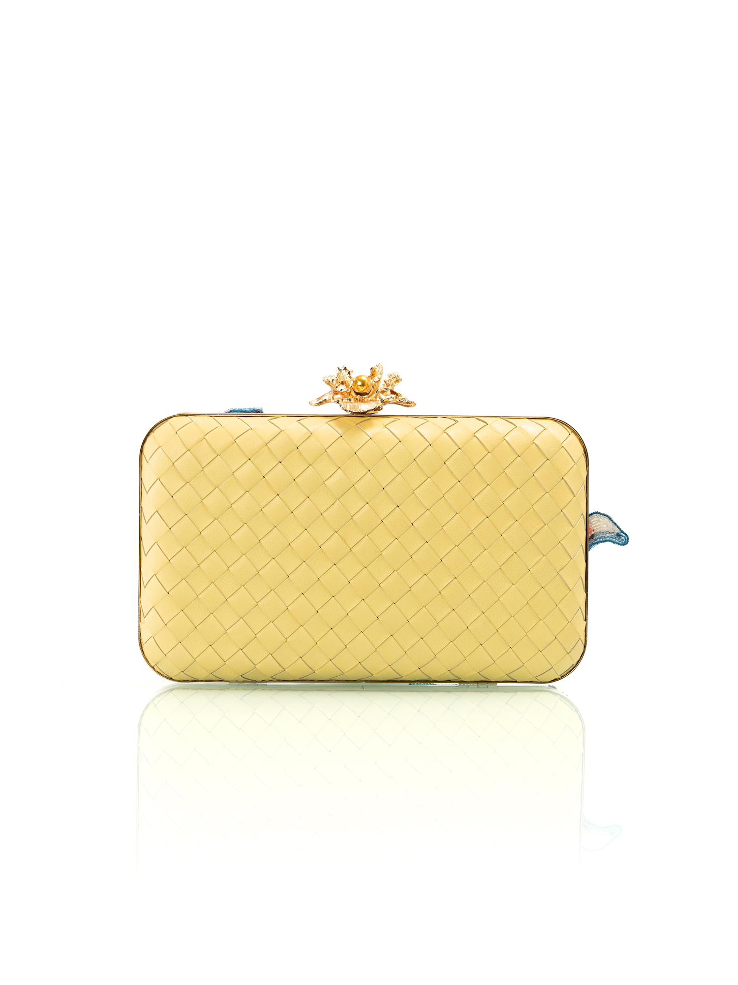 Embroidered yellow clutch with floral tulip detailing crafted as a premium leather accessory