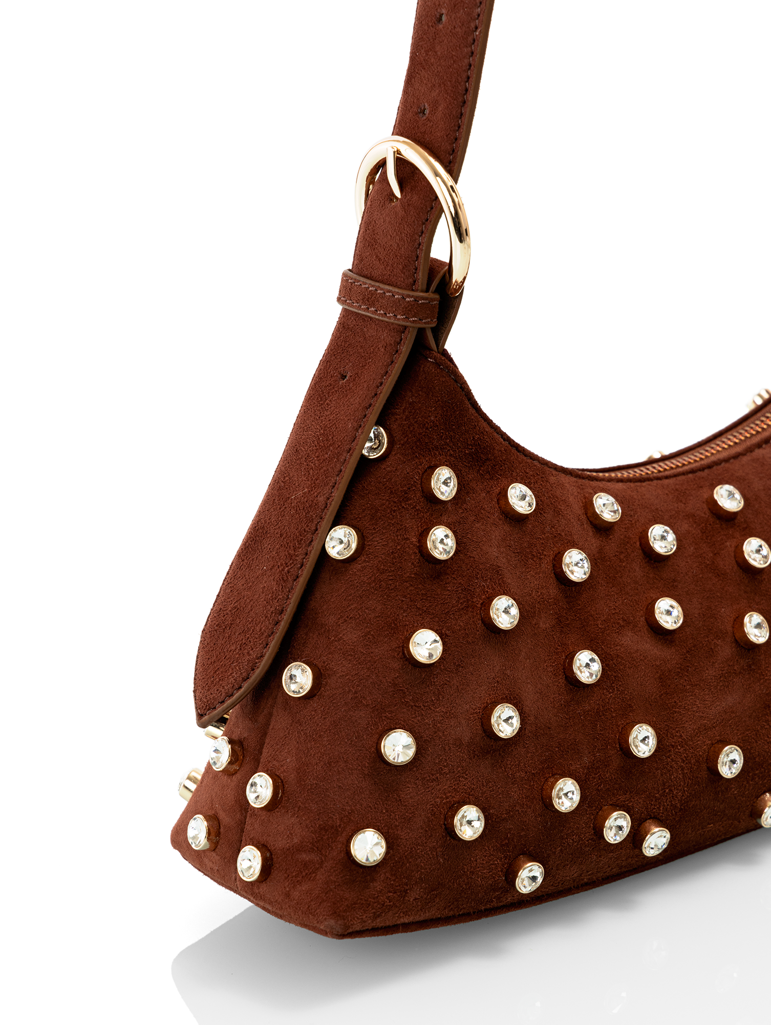 Handcrafted embroidered genuine leather bag with quilted detailing for a minimal party look