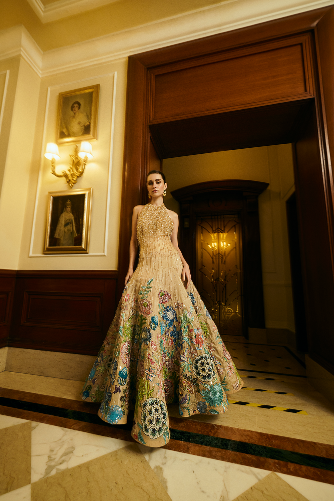 Reception wear dress designed as a formal evening wear full length gown