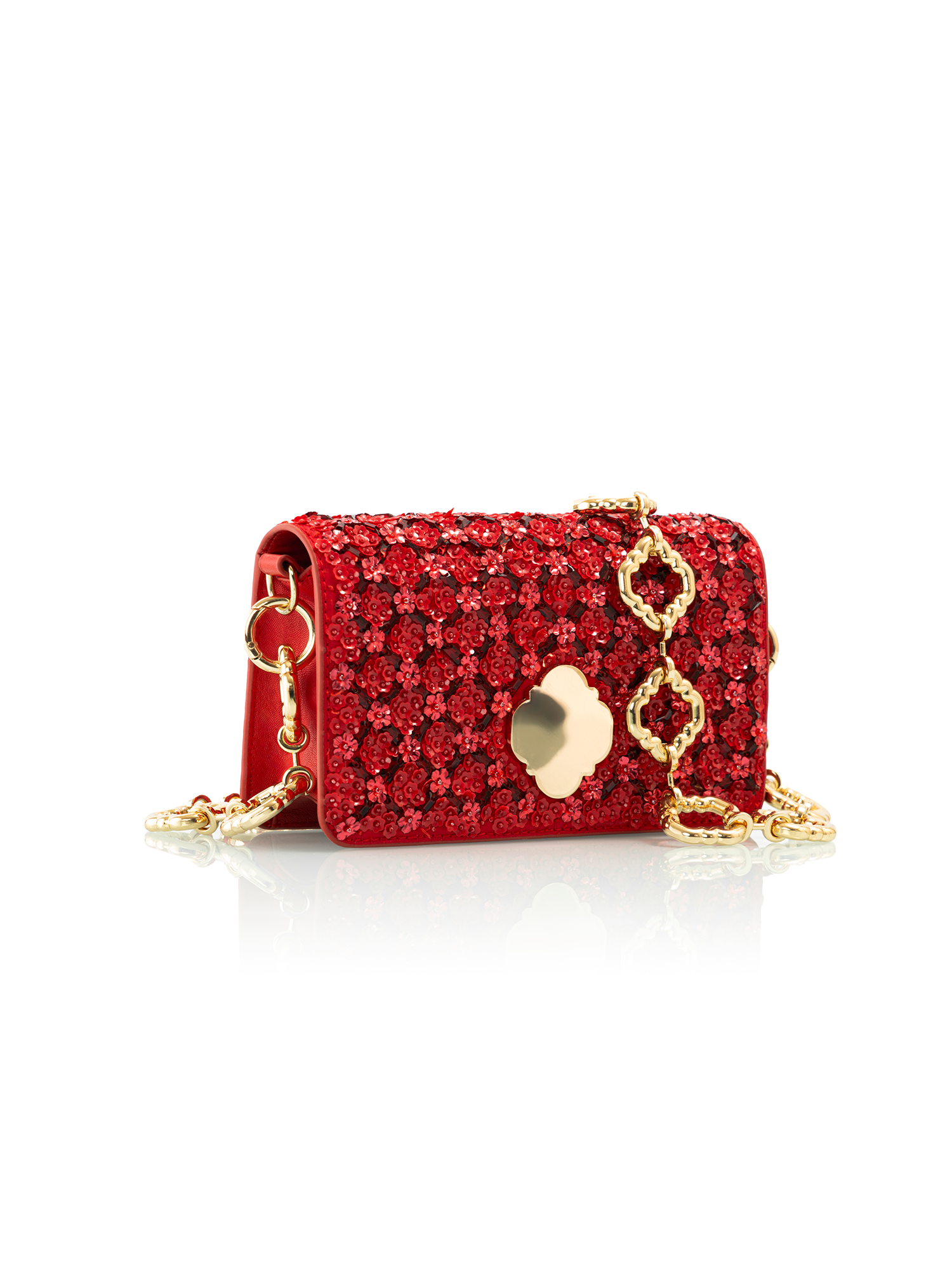 Handcrafted studded leather bag in ruby woo shade designed as an embellished evening accessory