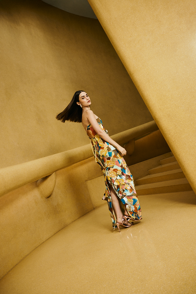 Elegant beaded dress styled as a guest of wedding outfit for evening celebrations