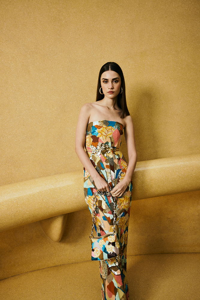 Multi coloured beaded dress styled as a resort party dress for elegant vacation evenings