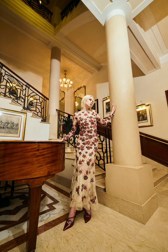Luxury vacation wear evening gown with hand-embroidered floral motifs for resort celebrations