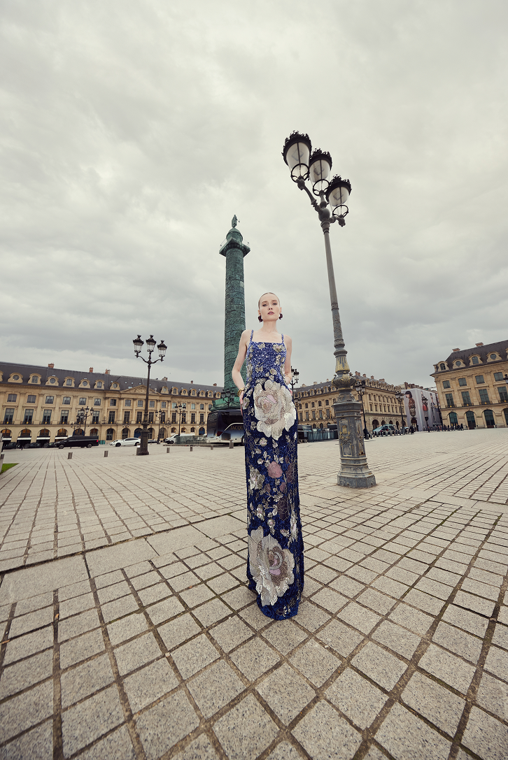 Crystal-embellished dress featuring delicate rose motifs and couture-inspired detailing.