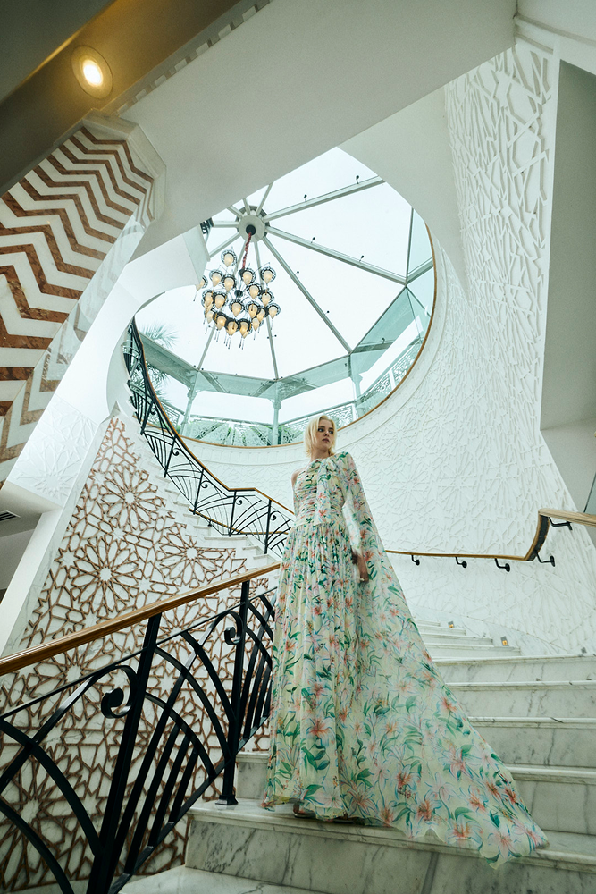 Sheer cape overlay design paired with a floral cape gown for modern ethnic styling