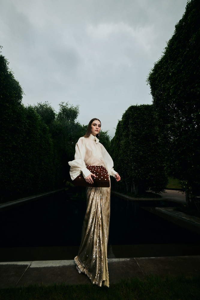 Draped sequin skirt styled as a striking holiday party statement piece