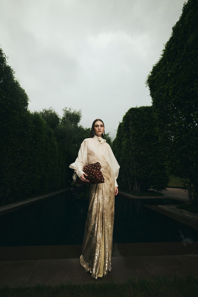 Holiday party statement piece featuring a draped sequin skirt silhouette