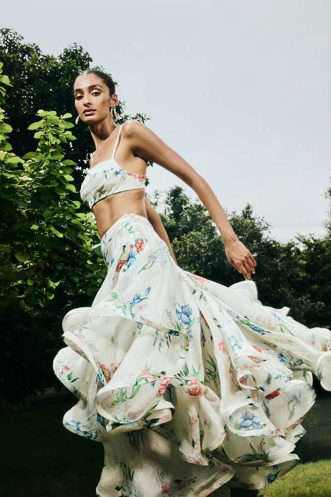 Tiered ruffled skirt designed as a refined guest of wedding outfit