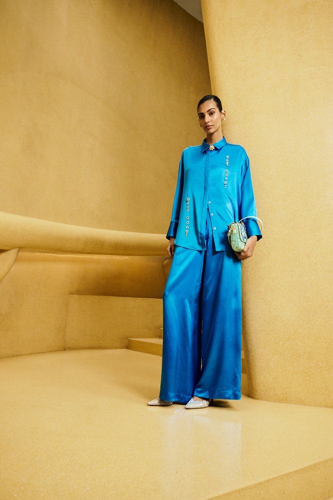 Silk satin blouse styled for a summer soirée style with effortless elegance