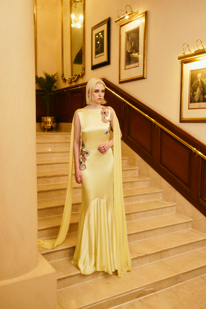 Satin finish gown styled as a timeless floor length dress