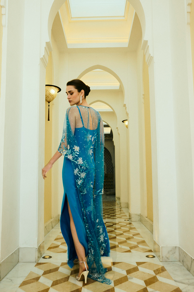 Guest of the wedding outfit styled as a floral floor-length dress