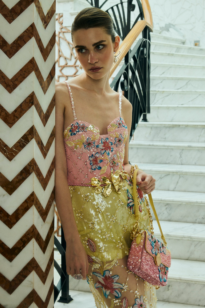 Luxury vacation wear styled as a fitted party dress with detailed couture handwork dress finishing