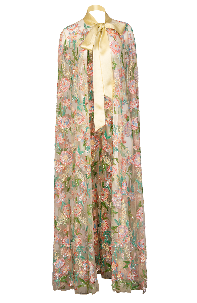 Couture handwork cape with beaded detailing, paired with an evening gown for an elegant evening event