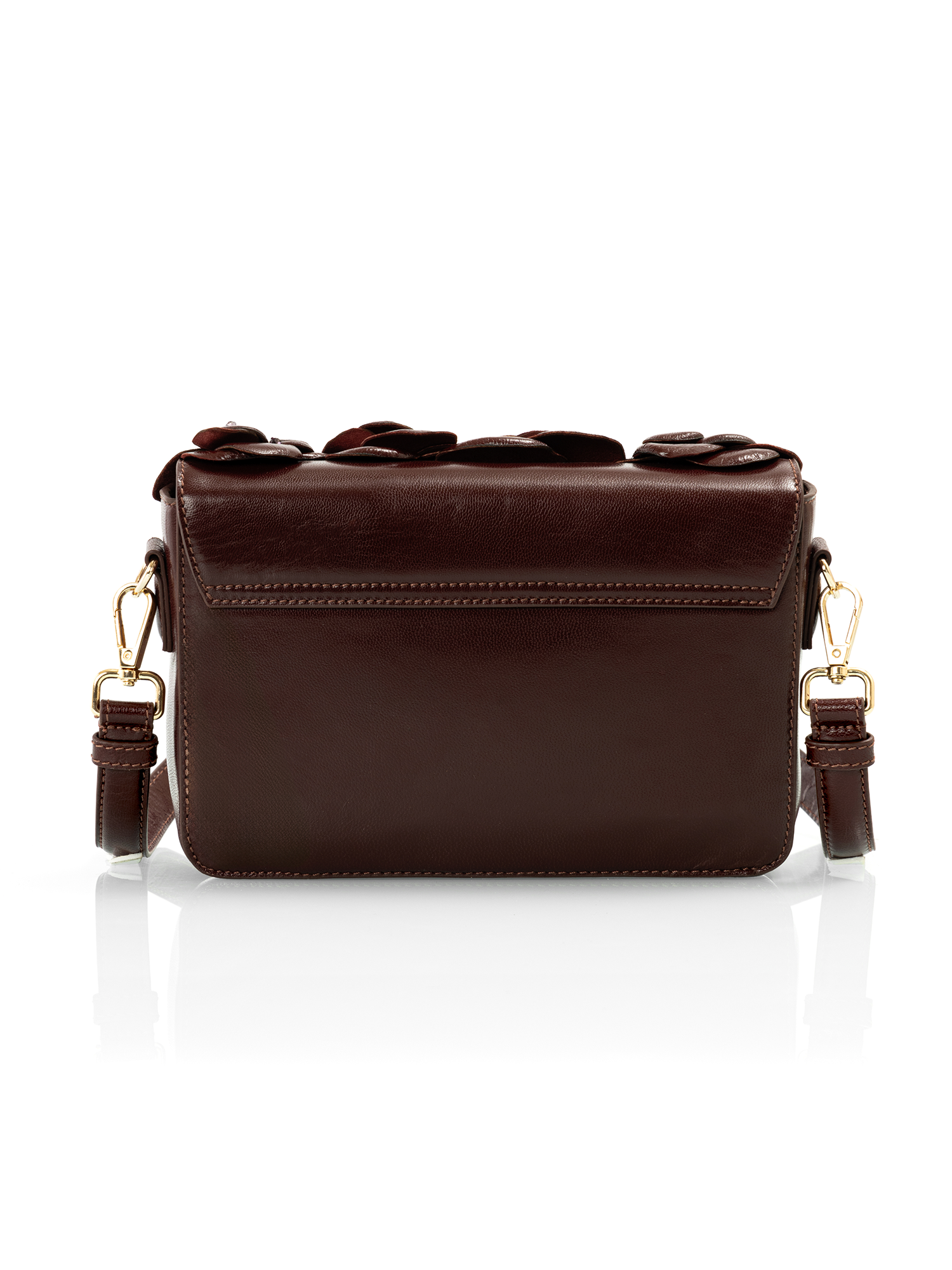 Handcrafted cherry red quilted leather bag showcasing premium craftsmanship for luxury occasions
