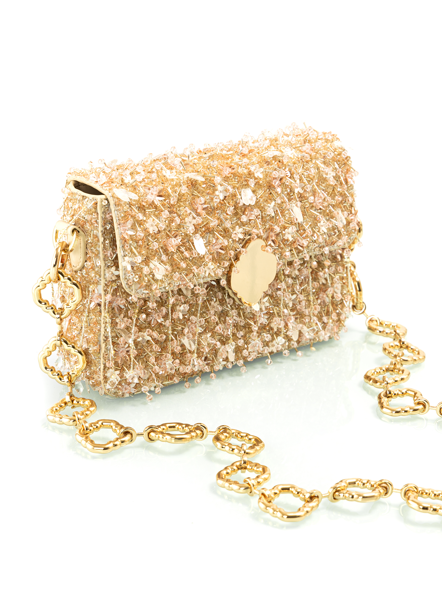 Close-up of handcrafted luxury embroidered leather bag created by artisan based brands
