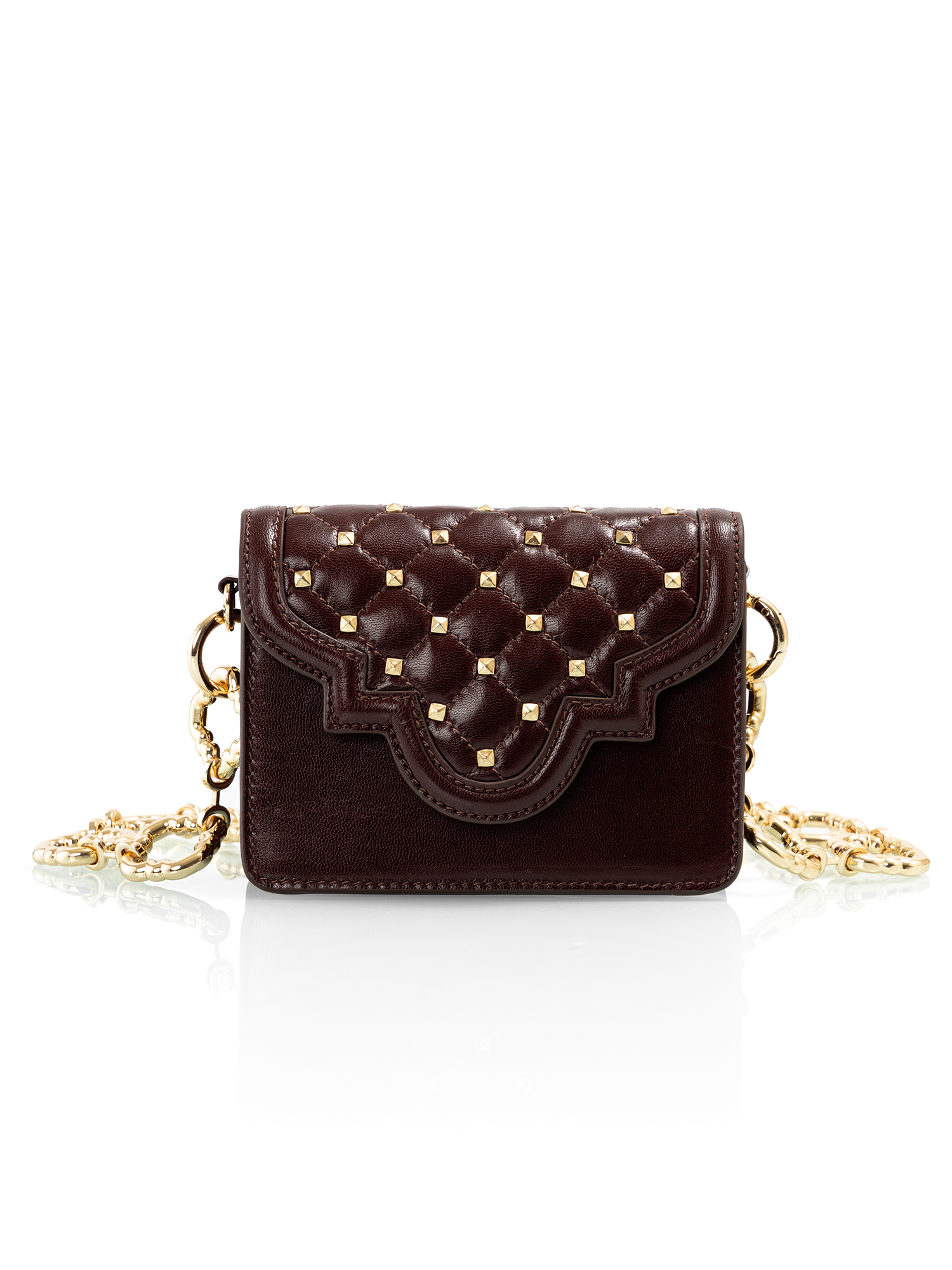 Handcrafted embroidered genuine leather bag with quilted detailing for a minimal party look
