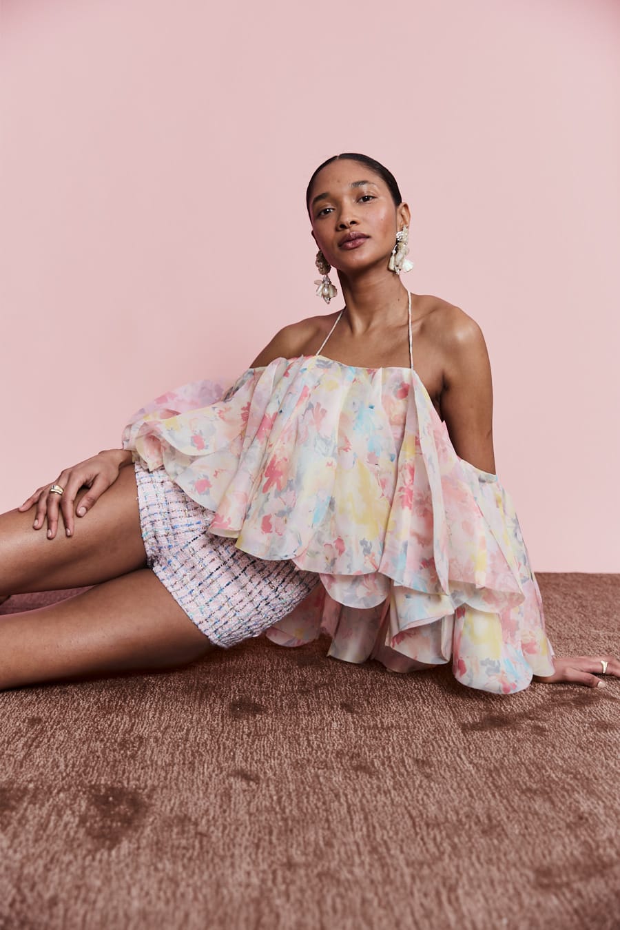 Luxury pink tweed micro shorts with high-waisted design, premium textured shorts for chic resort wear