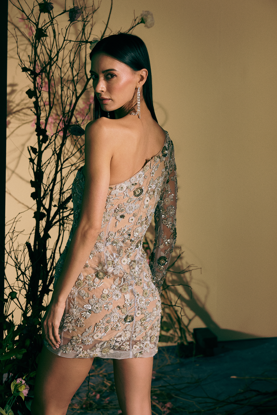Woman wearing a floral dress with a blurred background