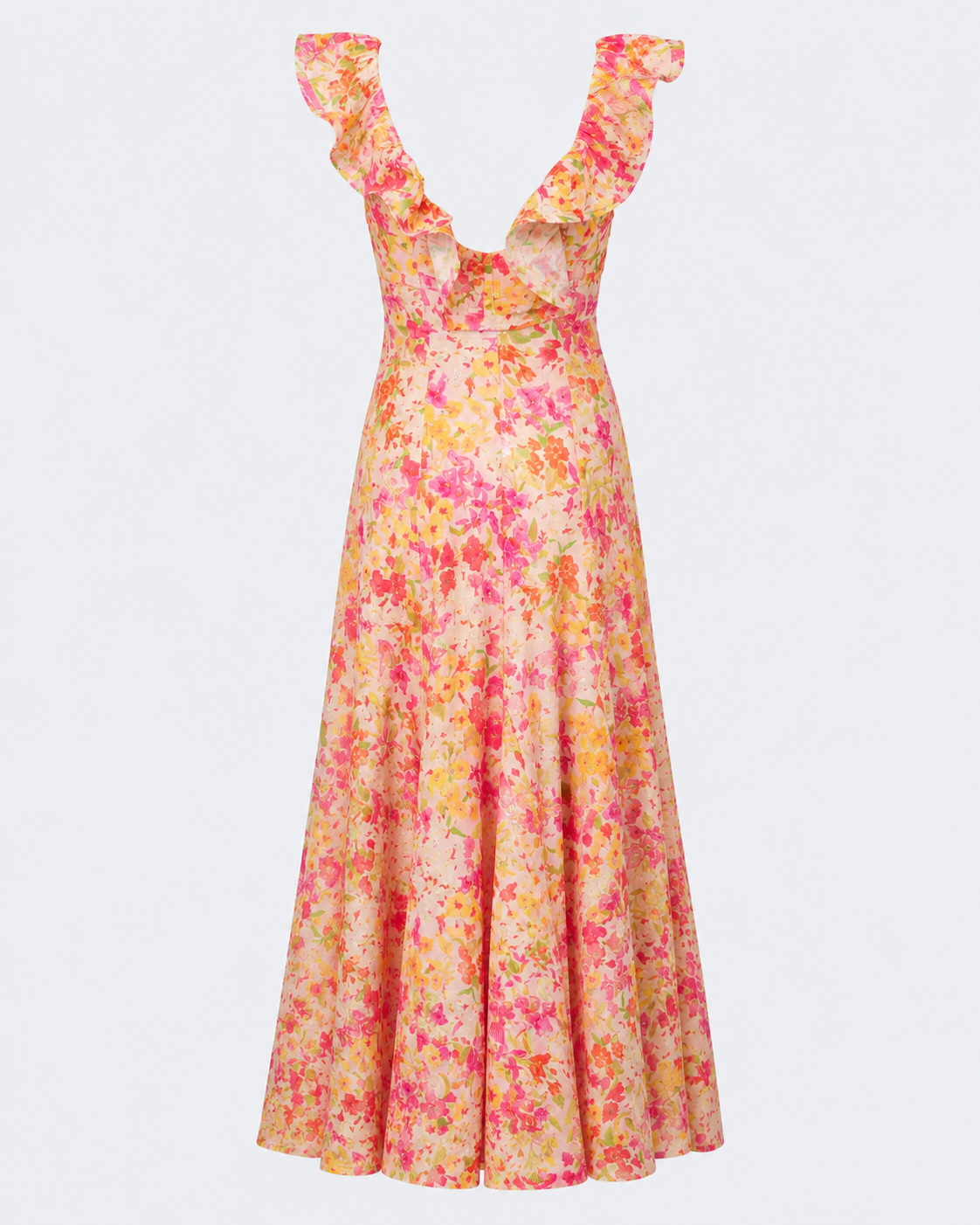 A sleeveless midi dress with ruffled shoulder straps and a deep V-neckline, featuring a vibrant pink, orange, and yellow floral print on a light peach background, shown against a light gray studio backdrop.
