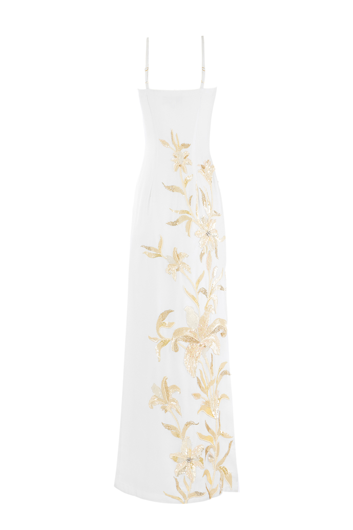 Statement white dress with embroidered florals and shimmering sequins from the pre-fall collection.