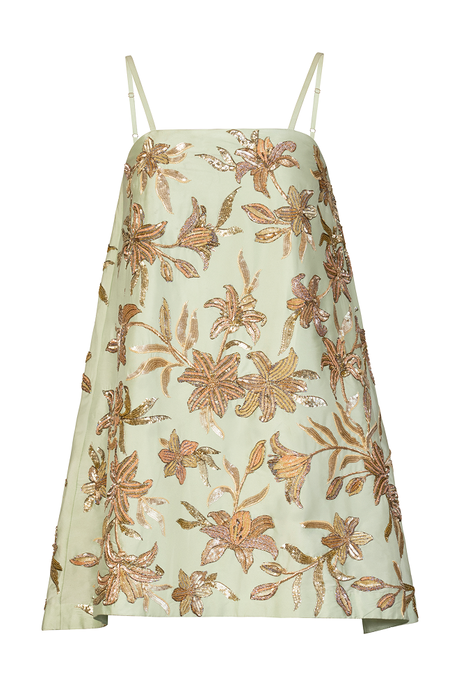 Guest of the wedding outfit styled as a reception wear dress with elegant beadwork