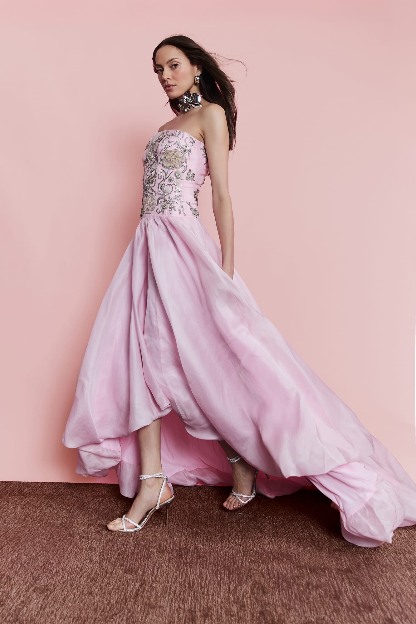 Couture pink gala dress with voluminous silhouette, high-fashion red carpet attire with crystalline embellishment
