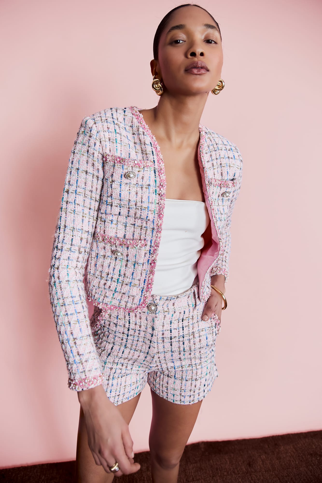 Luxury pink tweed shorts with high-waisted design, premium embellished tweed for sophisticated city style