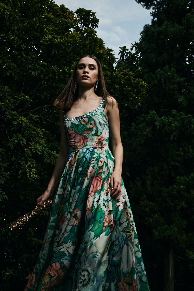 Flared dress crafted as a fit and flare embellished dress
