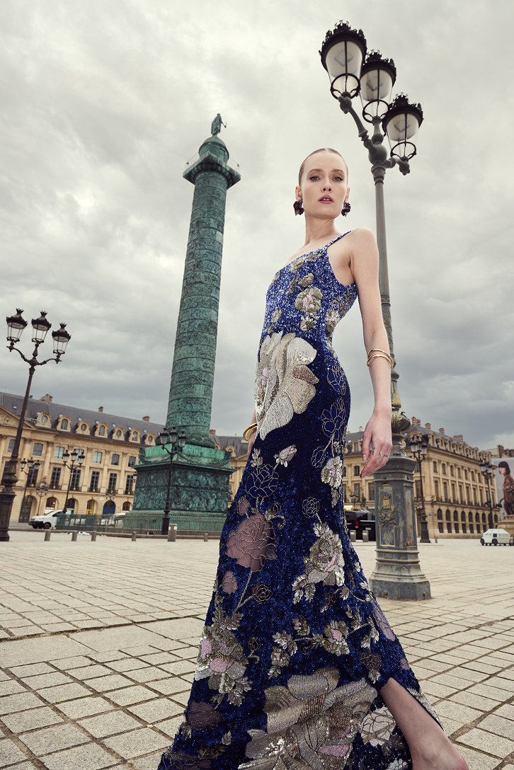 Floral column gown featuring sparkling crystal embellishments and elegant rose motifs.