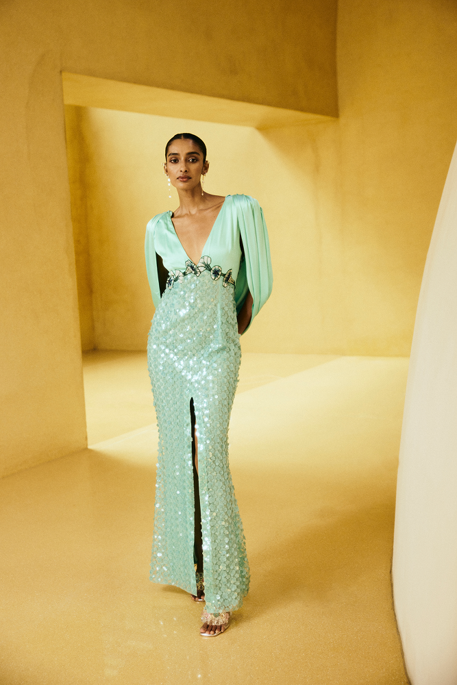 Luxury satin pants for women styled as premium womenswear bottoms for a refined vacation evening look
