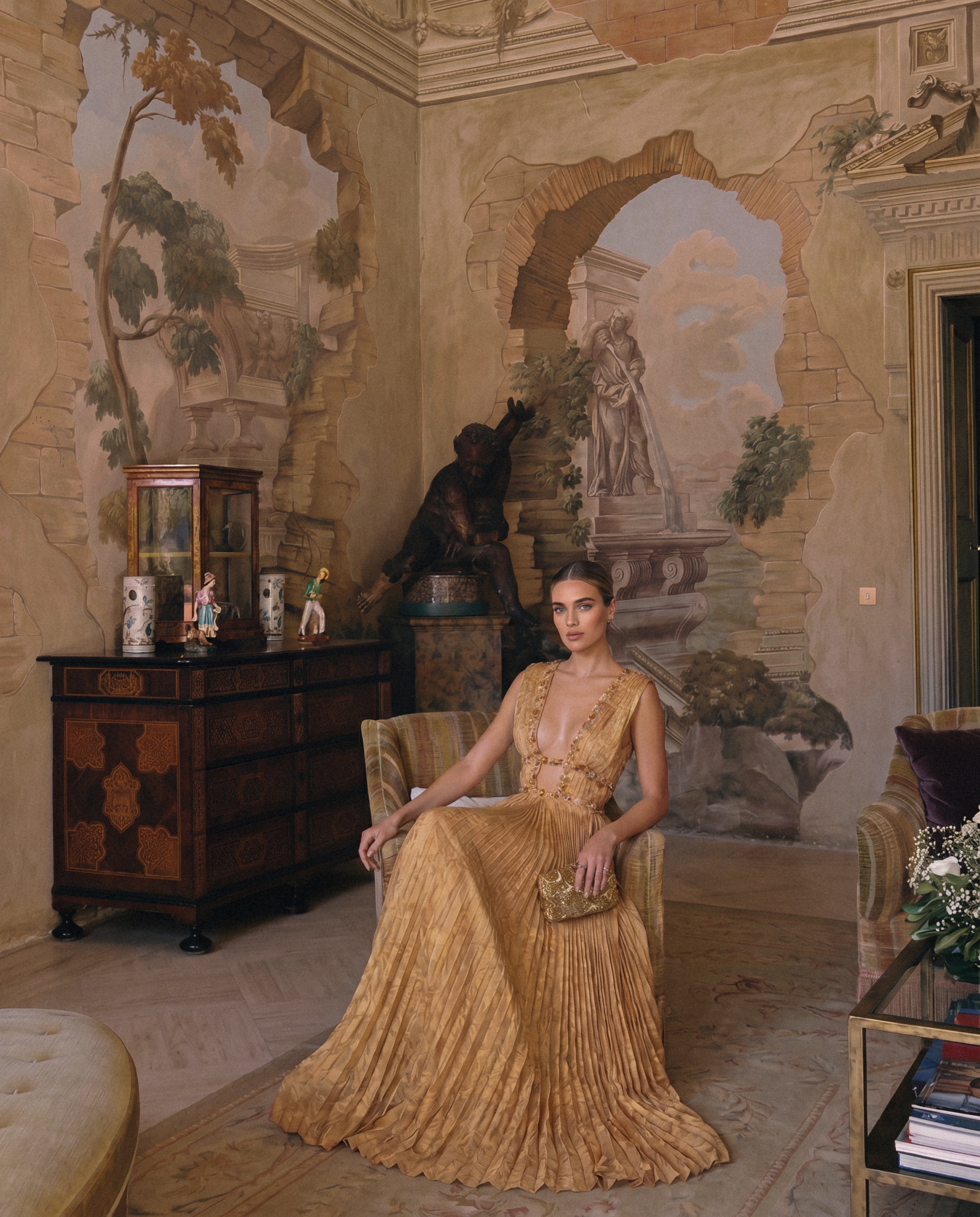 Romantic printed formal gown – luxury pleated floor length plunging neckline embellished waist designer evening dress