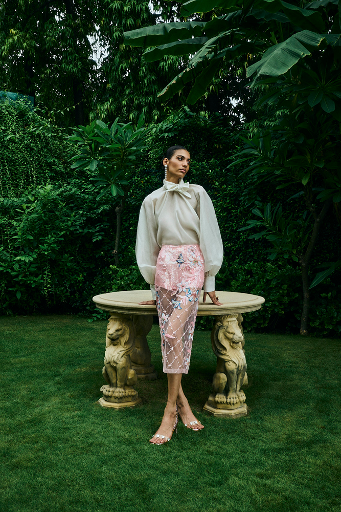 Floral embroidered skirt with sheer pink embellished and beaded detailing for a guest of the wedding outfit
