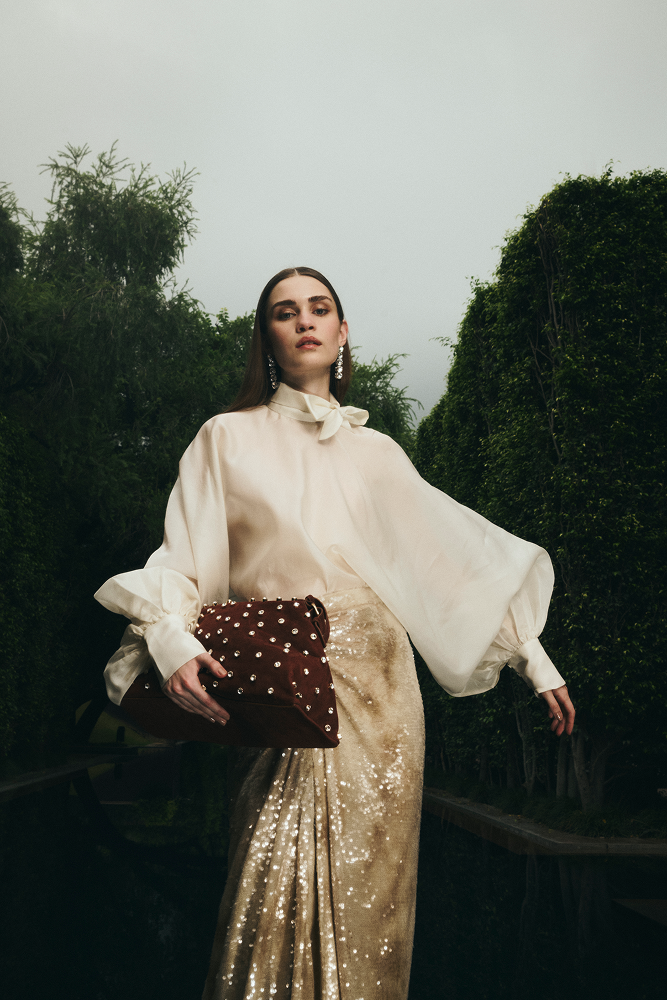 Voluminous tie-up top designed as a statement luxury evening wear blouse
