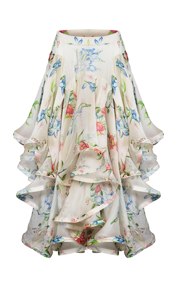 Voluminous layered organza skirt styled for an elegant destination gala outfit
