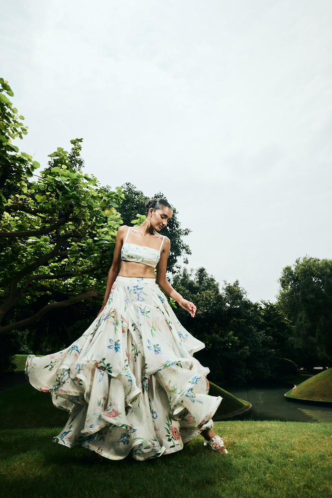 Guest of wedding outfit styled with a tiered ruffled skirt silhouette
