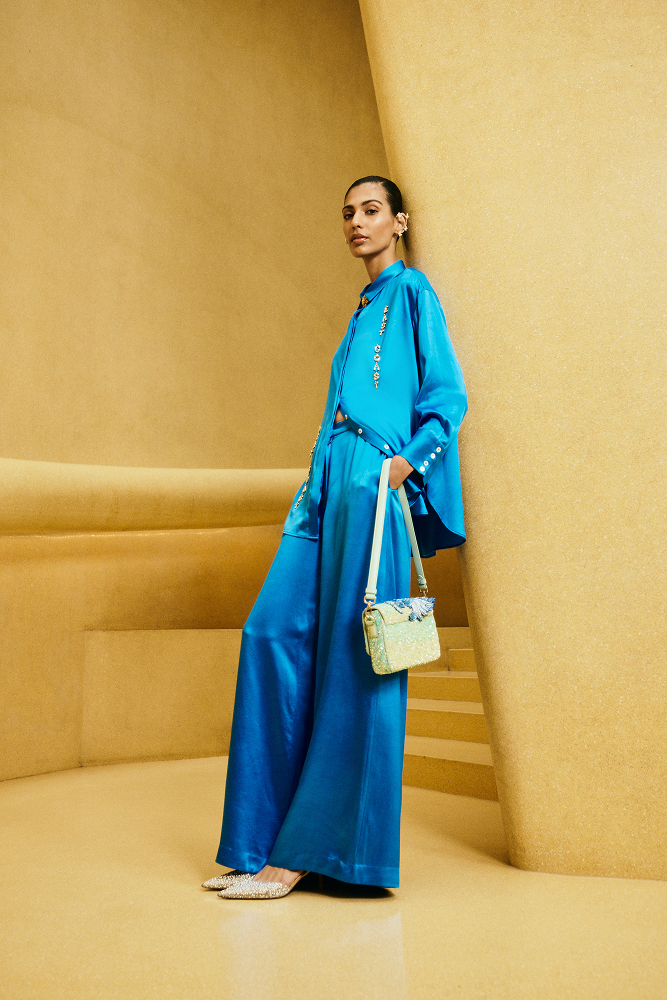 Luxury satin shirt for women designed as a premium womenswear top with a refined vacation evening look
