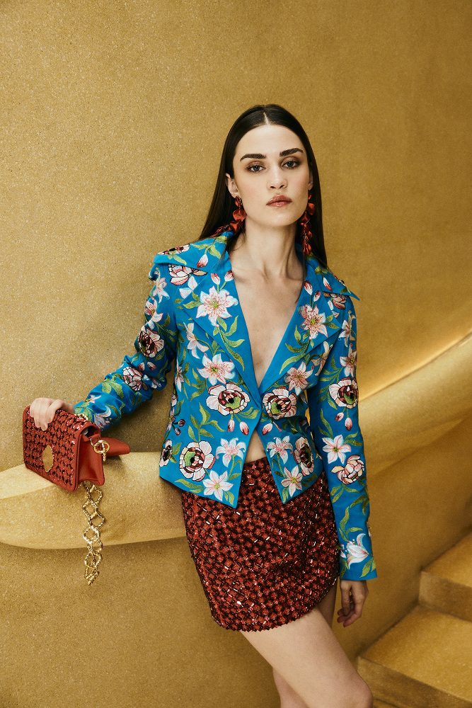 Structured power shoulder jacket designed for sophisticated wedding guest styling
