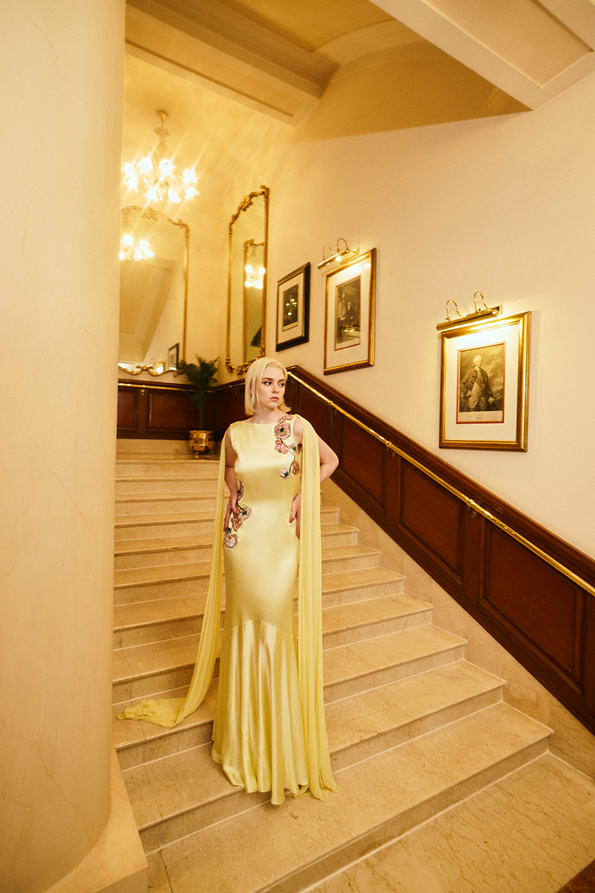 Mermaid silhouette dress styled as a graceful satin finish gown
