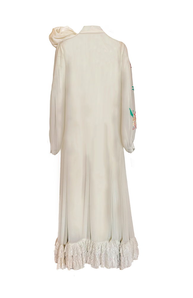 Garden party couture dress with hand-embroidered floral detailing
